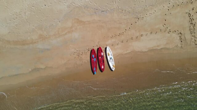Aerial view, Summer colorful seascape with three boat with torist and tropical beach. Beautiful paradise in sandy seaside. Peaceful andaman Movement camera is zoom out (2)