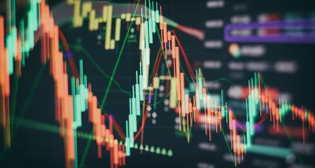 Foto op Aluminium Technical price graph and indicator, red and green candlestick chart on blue theme screen, market volatility, up and down trend. Stock trading, crypto currency background. © Maximusdn