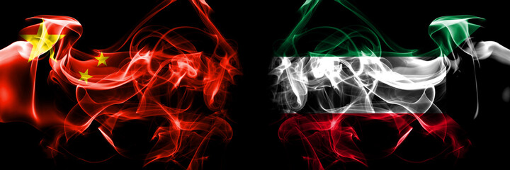 Flags of China, Chinese vs Kuwait, Kuwaiti. Smoke flag placed side by side on black background.