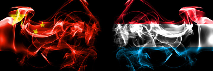 Flags of China, Chinese vs Luxembourg. Smoke flag placed side by side on black background.