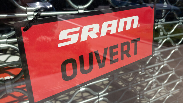 Sram logo brand and text sign on panel store write open bicycle shop door
