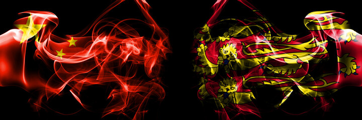Flags of China, Chinese vs United Kingdom, UK, Royal Banner England. Smoke flag placed side by side on black background.
