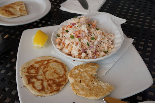 Chamorro style Shrimp Kelaguen served with bread, local food of Saipan, Northern Mariana Islands