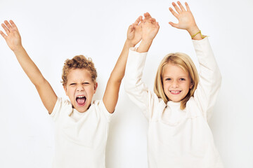 cheerful children dance gesticulate with their hands lifestyle