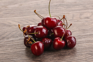 Ripe sweet cherry berries heap