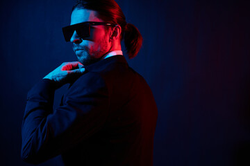 portrait of a man modern style suit fashion sunglasses lifestyle model