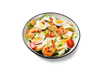 Fresh Shrimp Caesar Salad with parmesan cheese and Croutons. Isolated on white background