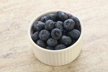 Sweet ripe blueberry heap in the bowl