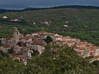 Fototapeta na wymiar High angle view of the historic center of small village Ramatuelle, French Riviera at the mediterranean coast with church and old buildings.
