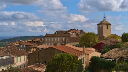 View over the historic center of small village Ramatuelle, French Riviera at the mediterranean coast with old church and traditional buildings.