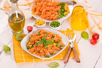 Fusilli pasta with peas and sweet corn.
