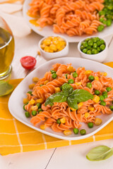 Fusilli pasta with peas and sweet corn.
