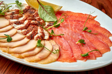 Japanese eel sashimi, salmon in white plate on wood background