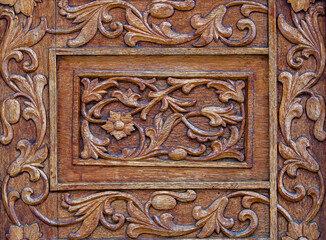 Wooden sculpture with floral motifs on the door of Sihla Monastery - Romania
