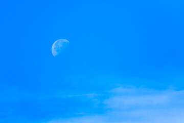Moon in blue sky