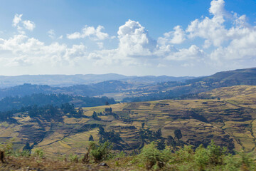 Fototapeta na wymiar Panoramic View to the Simien Mountains in the Clouds from the Gondar Road, Northern Ethiopia