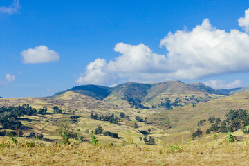 Fototapeta premium Panoramic View to the Simien Mountains in the Clouds from the Gondar Road, Northern Ethiopia