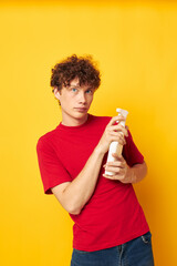 cute red-haired guy detergents home care posing isolated background unaltered