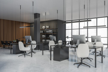 Corner view on dark office room interior with panoramic window