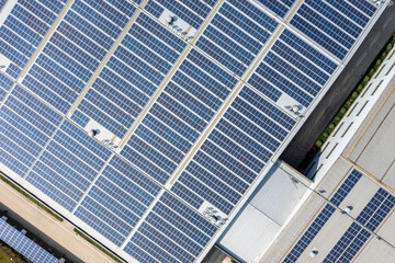 Obraz premium solar power station on factory rooftop