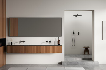 Light bathroom interior with two sinks and mirror, shower on podium