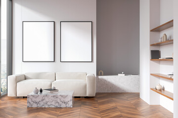 Bright living room interior with two white posters, panoramic window