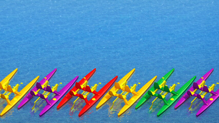 row of catamarans of different colors
