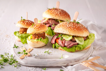 Delicious hamburger with beef, vegetables and sesame