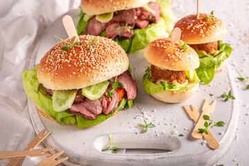 Hamburger with roasted seasoning beef and pickles