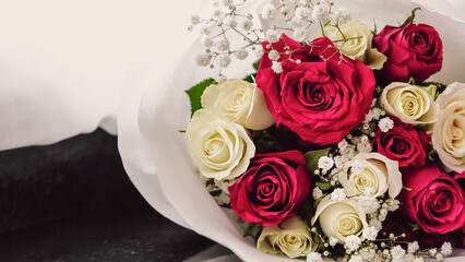 Fresh, lush bouquet of white and red roses. Window background. Happy birthday, valentines day or women's day 8 march concept.