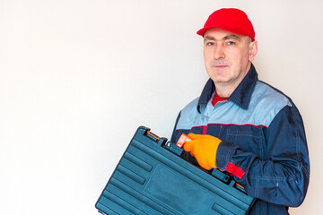  working man with a case.  tool box, person