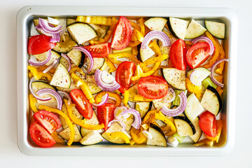 Oven Baking Vegetables, Peppers, Zucchini, Tomatoes on a Baking Tray, Sheet Pan Vegetables Background