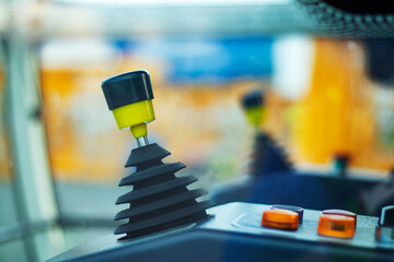 joystick for control system of tower crane in cabin. however this is equipment on construction site.