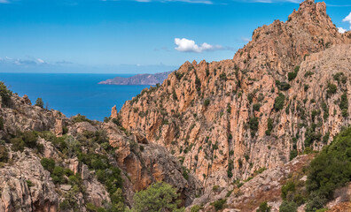 view of red rock and sea corsica