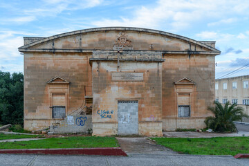 Fototapeta na wymiar Australia Hall was built by the Austrian Red Cross in 1915 for entertaining the wounded ANZAC troops during the First World War. It was badly damaged by fire in 1998. - Pembroke, Malta.