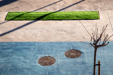minimal composition in the city: sea grass concrete urban space