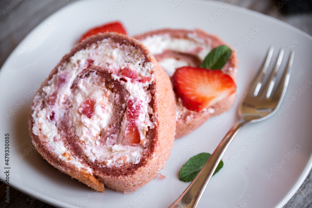 Wall mural delicious strawberry roll cake with white cream, homemade baked dessert