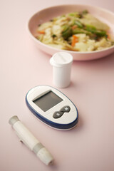 diabetic measurement tools and healthy food on table 