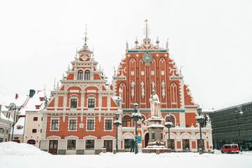 Winter cityscape of Old town of Riga, Latvia. The House of the Blackheads. Christmas tree. Town Hall Square.