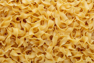 Raw pasta isolated on white background.