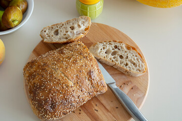bread with seeds and a jar of honey mixed with ginger, the concept of a healthy diet with environmentally friendly food that increases immunity.