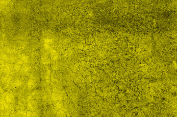 Yellow concrete wall surface with crack and grunge texture for background
