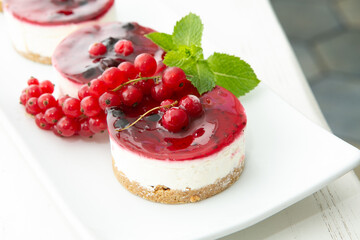 Mini cheese Cake with berries and cranberries