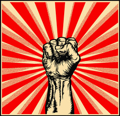 Vector illustration of strong raised fist in a ray red background in the style of soviet propaganda posters.