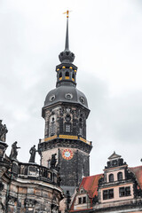 Fototapeta na wymiar Hausmannsturm tower and Dresden Cathedral Catholic Court Church in the old town or Altstadt of Dresden