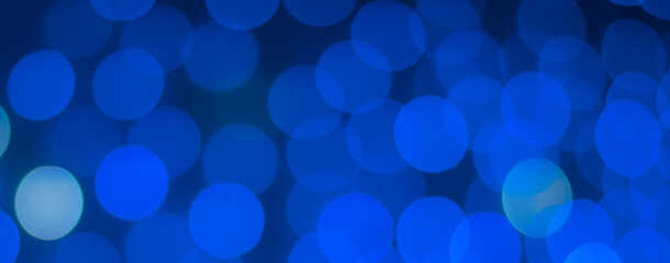 Beautiful  round bokeh in blue color. Banner.