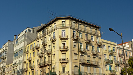 Detail of  a typical Portuguese apartment building in pastel colour