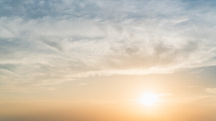 sunset sky and clouds in the evening with orange sunlight