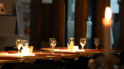 Restaurant interior impressions with lights in a dark-lid room in Berlin, Germany.