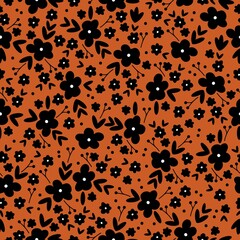 Beautiful vintage pattern. Black flowers and leaves . Terracotta background. Floral seamless background. An elegant template for fashionable prints.